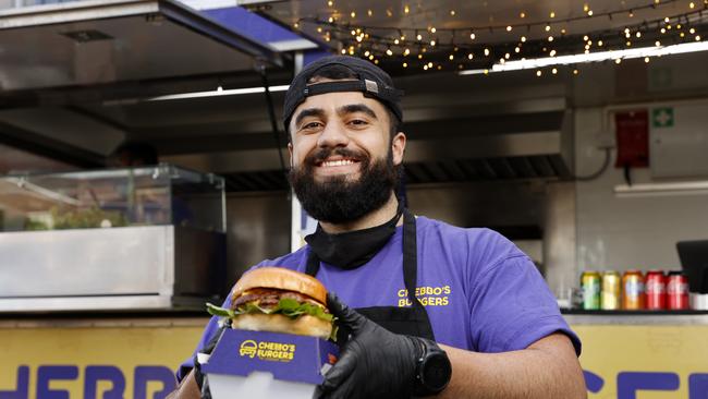 Ali Chebbani from Chebbos Burgers is the ultimate lockdown success story. His burger tutorials on Tik Tok became a sensation which led to at home burger kits. His Roselands food truck is a massive hit. Picture: Jonathan Ng