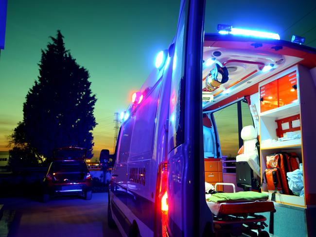 Emergency Ambulance at sunset istock