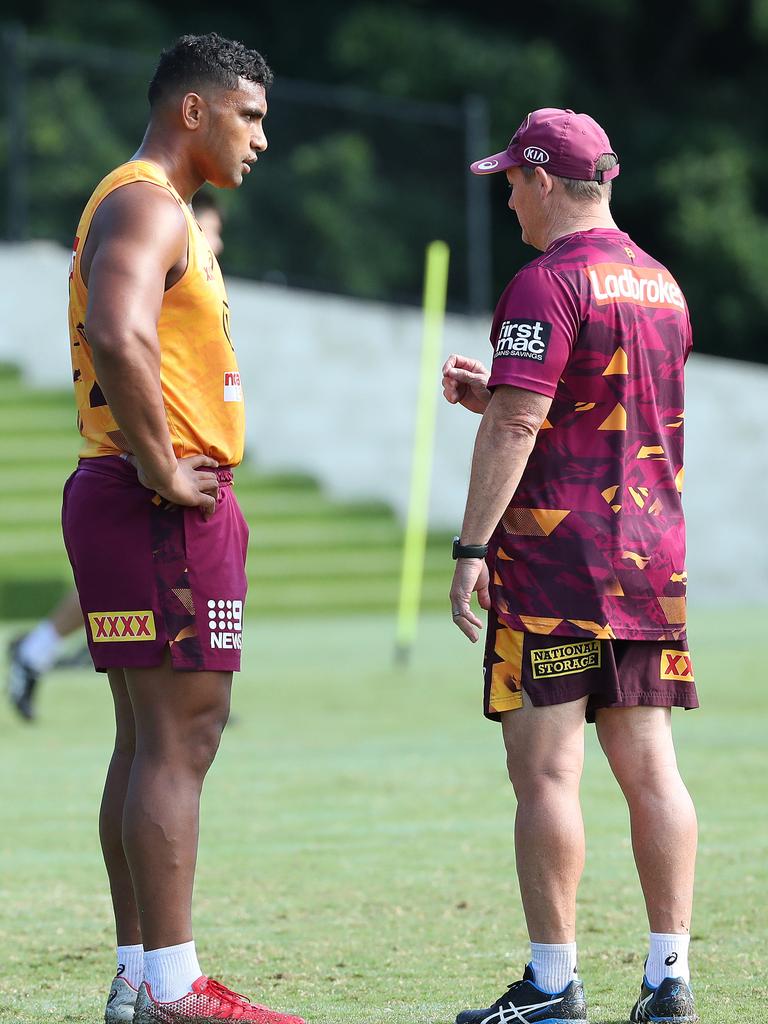 Tevita Pangai Jr and Kevin Walters attempt to talk during a training session.