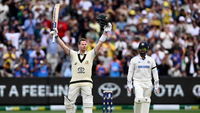 Smith enjoys the adulation of the MCG crowd as he celebrates his century in the fourth Test match against India on Friday. Picture: AFP