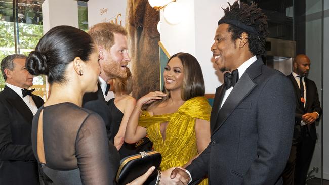 Prince Harry and Meghan, Duchess of Sussex meet Beyonce Knowles-Carter and Jay-Z at the European Premiere of Disney's The Lion King.