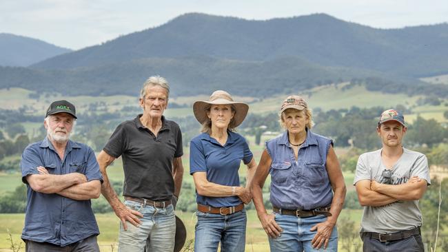 Kiewa Valley farmers, from left, Paul Ingram, John and Sharon McEvoy, Chris Hicks and Mick Fisher-Smith are fighting the creation of a lithium battery facility near Dederang. Picture: Zoe Phillips