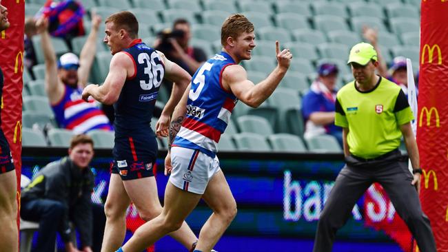 Josh Glenn celebrates kicking a goal for Central District in last year’s elimination final against Norwood — which he will line up for on Sunday. Picture: Tom Huntley.