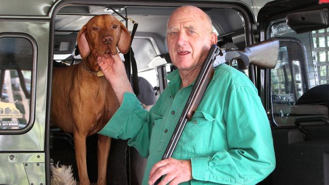 Duck hunter Peter Darke at home about to head out to a shoot. Pictured with his dog Kouta.