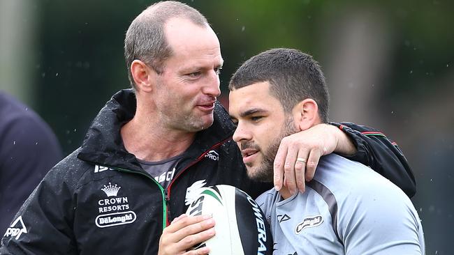 SYDNEY, AUSTRALIA - MARCH 27: Adam Reynolds and coach Michael Maguire talk during a South Sydney Rabbitohs NRL training session at Redfern Oval on March 27, 2014 in Sydney, Australia. (Photo by Renee McKay/Getty Images)