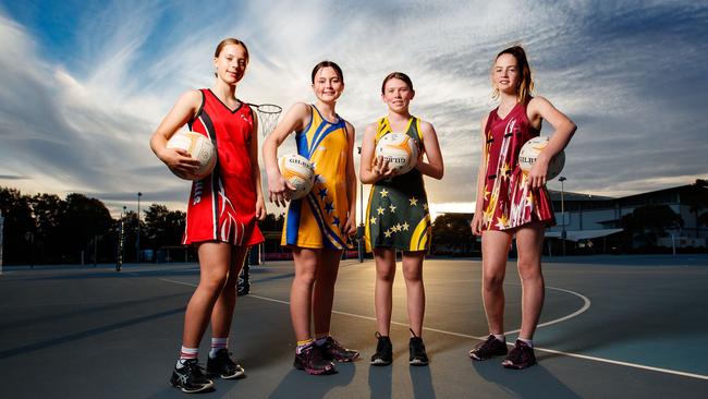 Gemma Grivell (Mid Hills), Scarlett Prestwood (Southern Hills), Ashleigh Cross (Great Southern) and Samantha Penna (Gawler and Districts) get set for The Advertiser’s live stream of the Netball SA Country Championships. Picture: Matt Turner