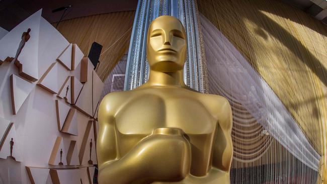 (FILES) In this file photo taken on February 8, 2020 an Oscars statue is displayed on the red carpet area on the eve of the 92nd Oscars ceremony at the Dolby Theatre in Hollywood, California. - Hollywood's motion picture academy unveiled strict new eligibility rules to boost diversity among best picture Oscars nominees and the wider movie industry in a landmark announcement on September 8, 2020. (Photo by Mark RALSTON / AFP)