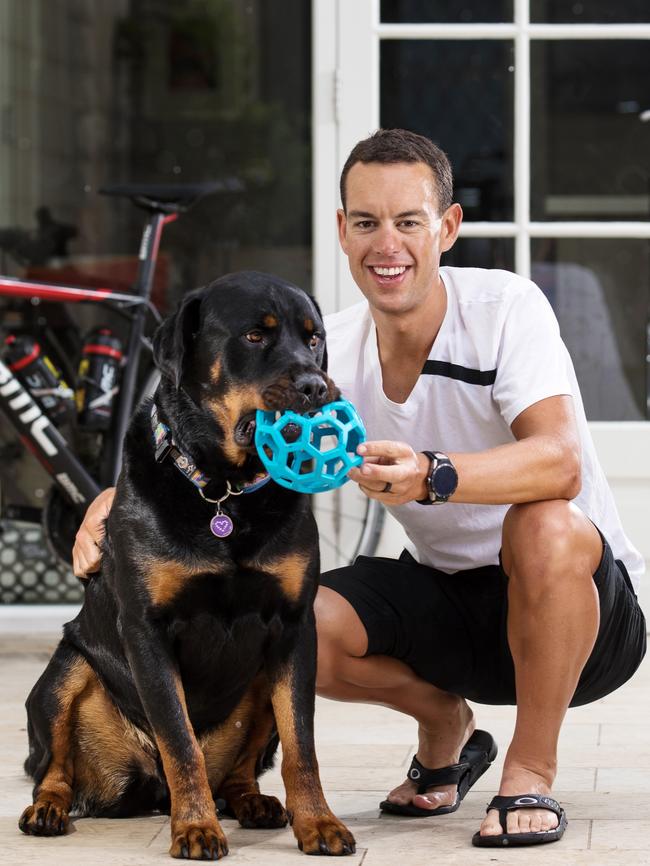 Champion cyclist Richie Porte at his Launceston home with his dog Fritz. Picture: Grant Wells.