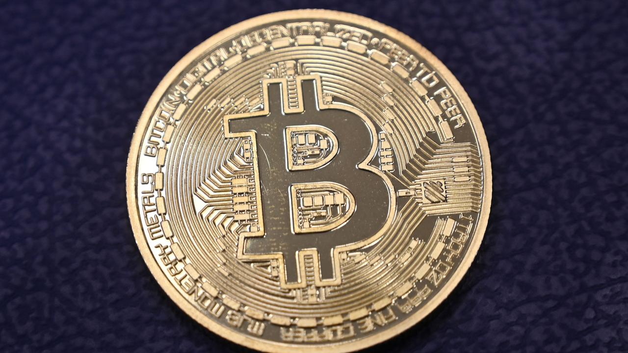 One investment firm has predicted bitcoin is going to surge above the $US300,000 mark. Picture: Ozan Kose/AFP