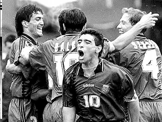 Argentina’s captain Diego Maradona [c] yells out as he and his teammates celebrate after Argentina scored their second goal in their match against Greece. At rear are from left Jose Chamot, Abel Balbo and Roberto Sensini. Argentina won 4-0 21 June 1994