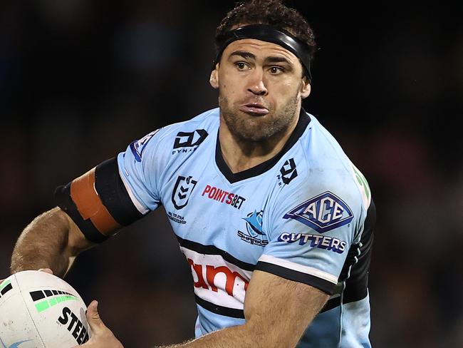 PENRITH, AUSTRALIA - JULY 23: Dale Finucane of the Sharks passes the ball during the round 19 NRL match between the Penrith Panthers and the Cronulla Sharks at BlueBet Stadium on July 23, 2022, in Penrith, Australia. (Photo by Matt Blyth/Getty Images)