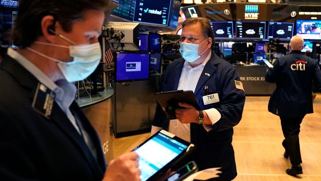 Traders work on the floor at the New York Stock Exchange in New York. Picture: AFP