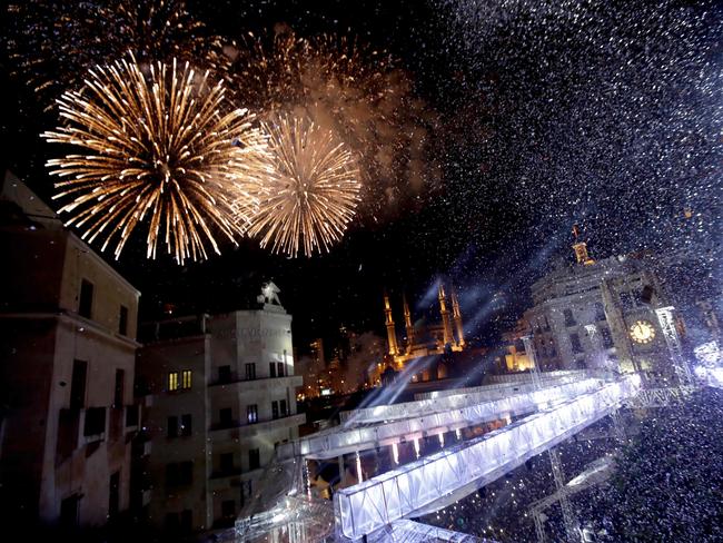 Fireworks explode over downtown Beirut, Lebanon, during New Year's celebrations on January 1, 2019. Picture: AFP