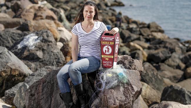 Kellie Lindsay oversees the project of placing tackle bins around popular fishing locations on the Gold Coast to collect used and unwanted fishing tackle and line. Pic Tim Marsden