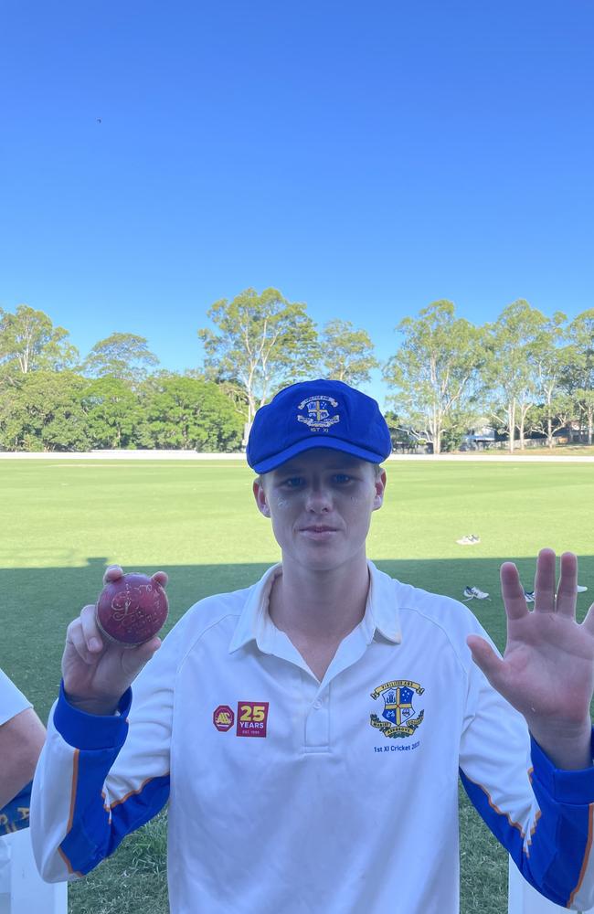 Louis Morris with the game ball after taking five.