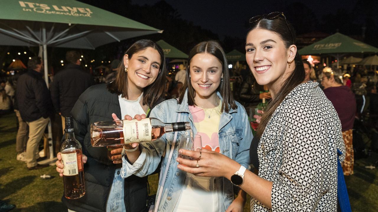 At Carnival of Flowers Festival of Food and Wine are (from left) Olivia Raccanello, Kodi Koina and Renee Clark. Picture: Kevin Farmer