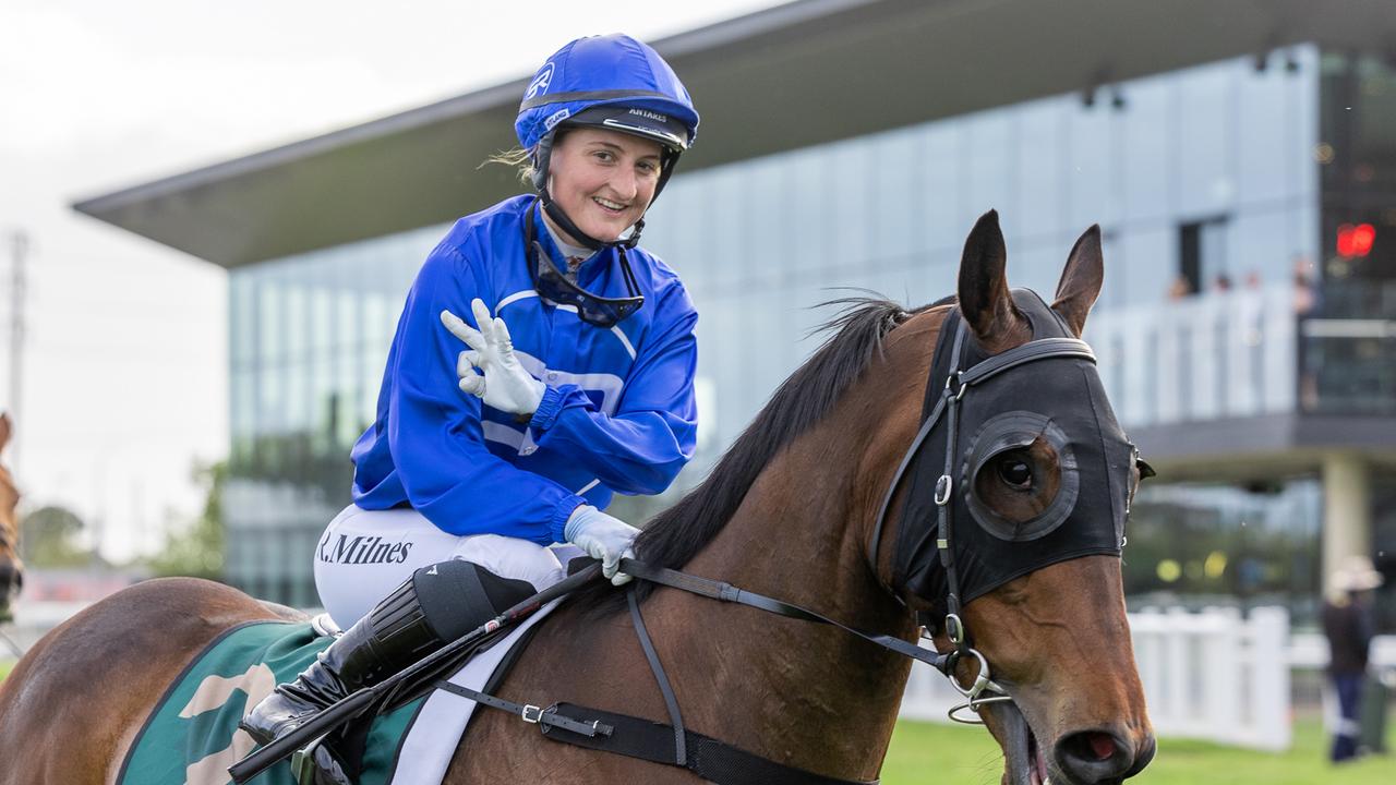 Apprentice jockey Rochelle Milnes celebrates a treble aboard Santastico at Morphettville on Saturday. Picture: Makoto Kaneko