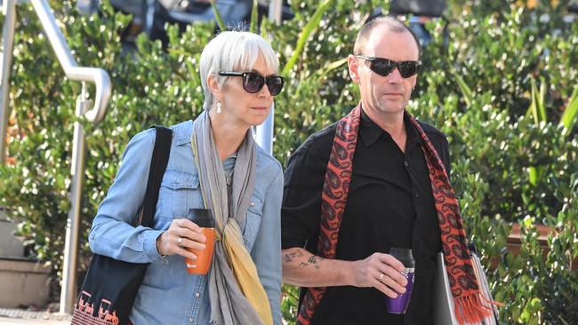 The parents of Caitlyn Fischer, Ailsa Carr and Mark Fischer arrive at the Lidcombe Coroner's Court yesterday. Picture: AAP