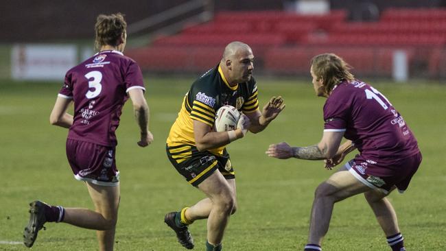 Wattles Braydon Wilson takes on the Dalby line. Picture: Kevin Farmer