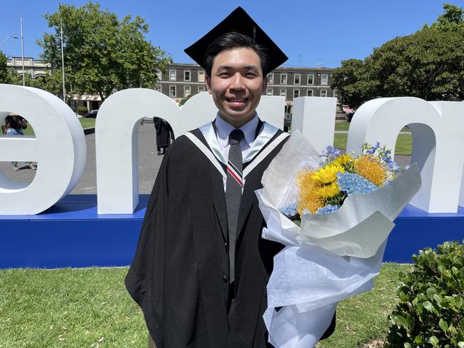 Brian Nguyen graduates with a Bachelor of Commerce at the 2024 University of Melbourne graduations. Picture: Himangi Singh