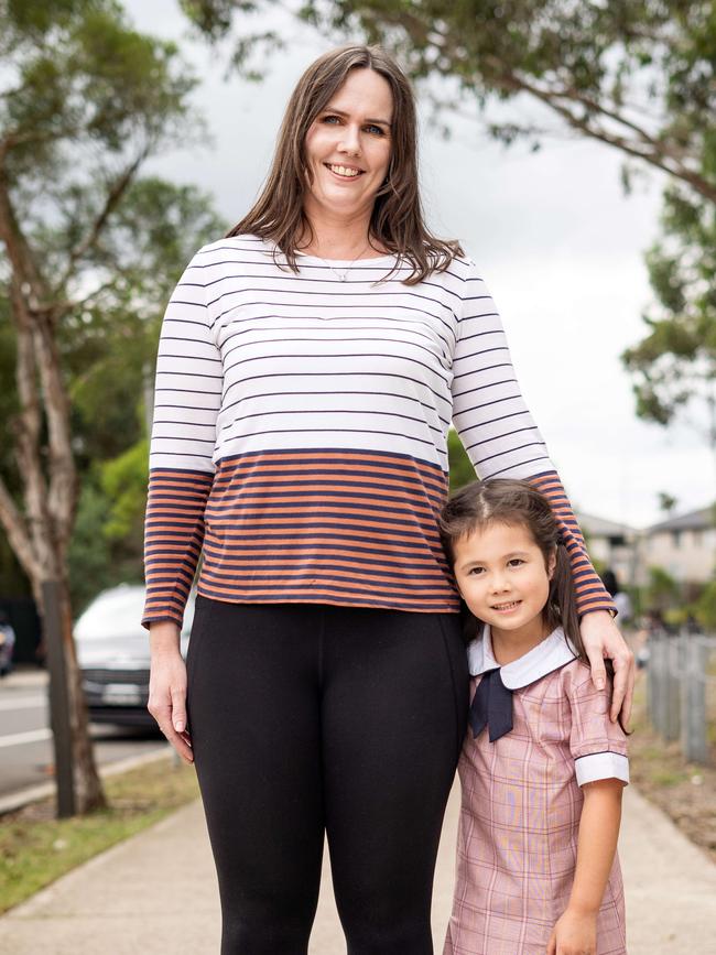 Hayley Kim, 42, with daughter Alice, 6, at Riverbank Public School. Photo: Tom Parrish