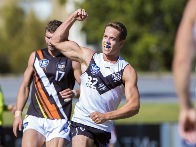 Tom Wilkinson celebrating after kicking a goal in the Southport Sharks' win over Northern Territory Thunder. Picture credit: TJ Yelds, NEAFL.