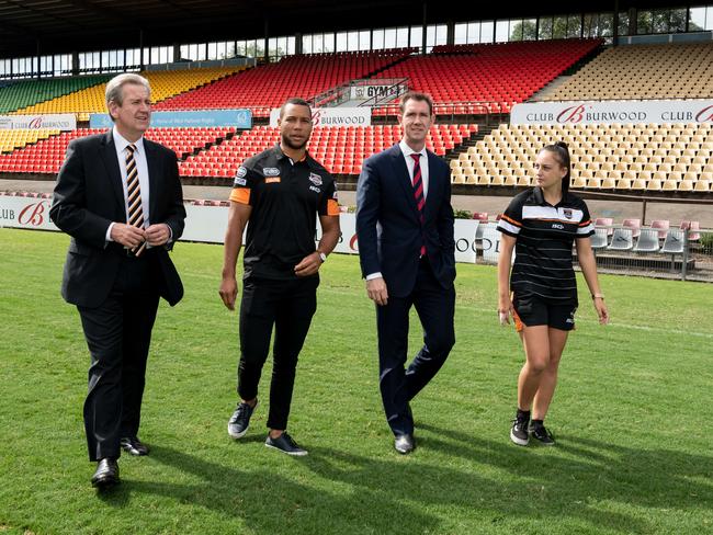 Former NSW premier Barry O’Farrell, Tigers captain Moses Mbye, Labor candidate for Reid Sam Crosby and Tigers player Trinity Sullivan. AAP IMAGE / MONIQUE HARMER