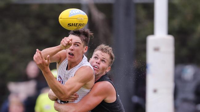 Connor Rozee is tackled by Dan Houston during the Power’s intra-club match at Alberton Oval. Picture: Matt Turner/AFL Photos via Getty Images