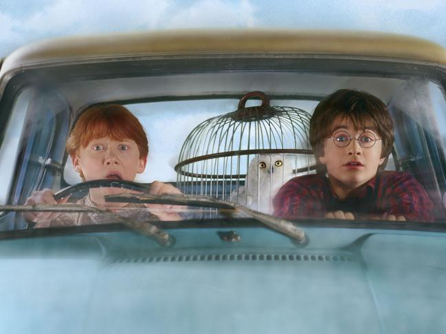 Actor Daniel Radcliffe (r) with Rupert Grint (l) in scene from film Harry Potter and the Chamber of Secrets. /Films/Titles/Harry/Potter/and/the/Chamber/of/Secrets