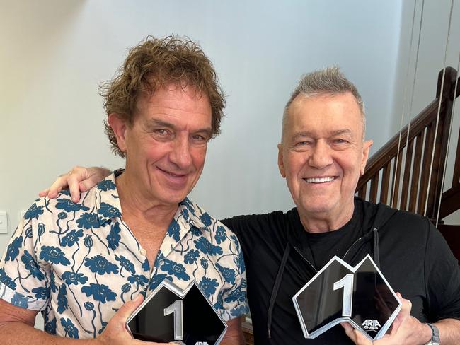 23/08/2024: Cold Chisel band members Ian Moss (left) and Jimmy Barnes (right), pictured in Sydney with awards honouring the band's newest ARIA No.1 charting album, the compilation titled '50 Years - The Best Of', which debuted atop the chart ahead of the band's national tour. Picture: supplied