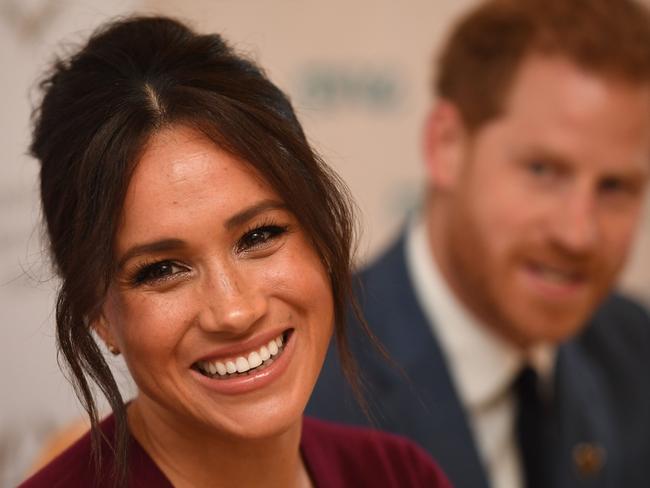 “Down-to-earth” Harry and Meghan ventured out from their expensive rental over Easter to deliver meals to the needy. Picture: AFP