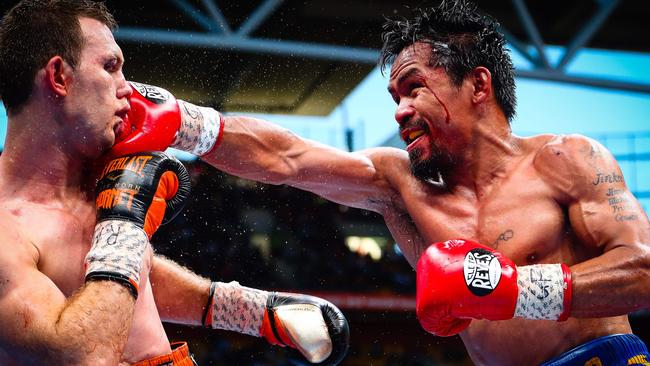 Manny Pacquiao (right) has attracted 96 per cent of all money wagered with TAB.