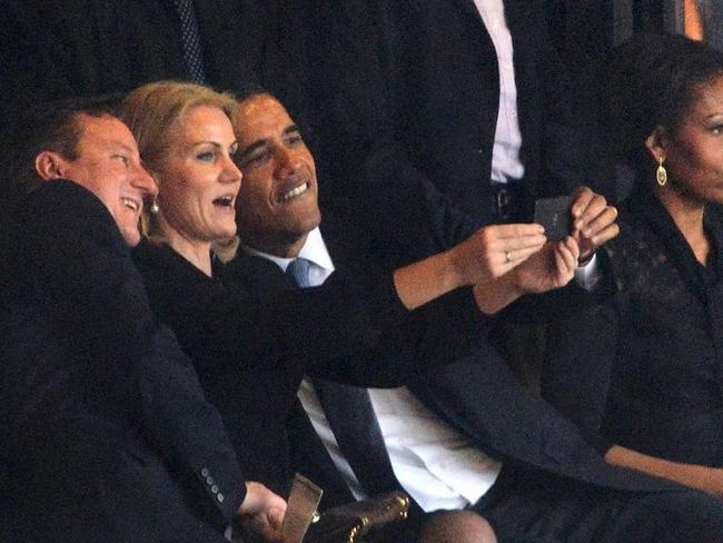 Selfie lover ... One of the most famous selfies from 2013 was taken of US President Barack Obama (right) and British Prime Minister David Cameron by Denmark's Prime Minister Helle Thorning Schmidt (centre) at Nelson Mandela's memorial.