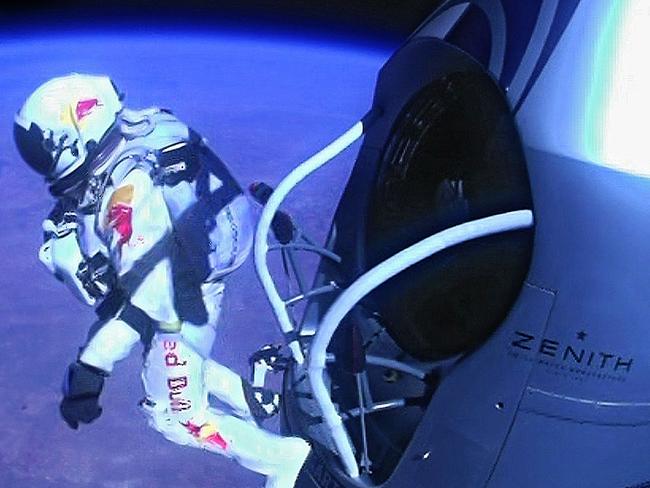 TOPSHOTS This picture provided by www.redbullcontentpool.com shows pilot Felix Baumgartner of Austria jumping out of the capsule during the final manned flight for Red Bull Stratos on 14 Oct 2012. The Austrian daredevil became the first man to break the sound barrier in a record-shattering freefall jump from the edge of space, organizers said. The 43-year-old leapt from a capsule more than 24 miles (39 kilometers) above the Earth, reaching a speed of 706 miles per hour (1,135 km/h) before opening his red and white parachute and floating down to the New Mexico desert. AFP PHOTO/www.redbullcontentpool.com/Jay Nemeth/HO RESTRICTED TO EDITORIAL USE - MANDATORY CREDIT &AFP PHOTO / www.redbullcontentpool.com / Jay Nemeth& - NO MARKETING NO ADVERTISING CAMPAIGNS - DISTRIBUTED AS A SERVICE TO CLIENTS = ONE-TIME PUBLICATION = IMAGE MUST NOT BE ALTERED OR MODIFIED