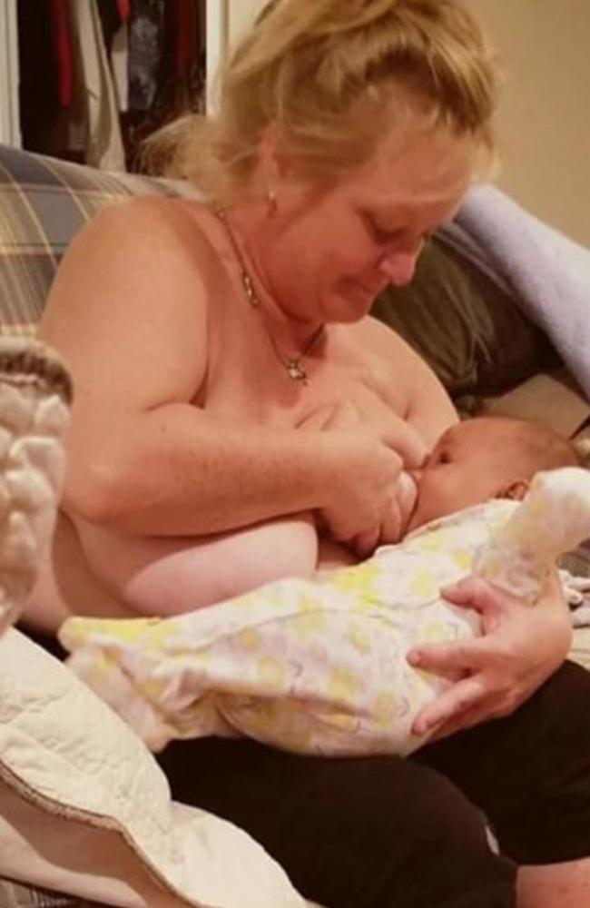 Grandmother Angela breastfeeds her granddaughter who is 10 months old. 
