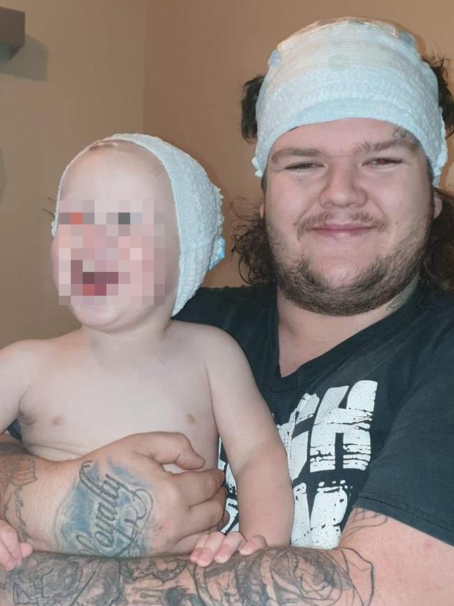 Alleged Burnie murder victim Bobby William Medcraft, 23, pictured with his young son. Picture: Facebook