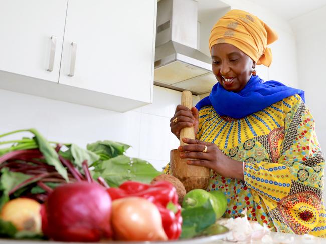 Saada Abdikarim works in her kitchen preparing a traditional Somali fried rice dish. Granville, Thursday, February 21st 2019. Africultures, the festival celebrating African cultures . One of the interesting parts of the festival is their food stallholders. (AAP IMAGE/ Angelo Velardo)