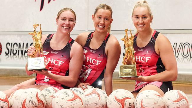 SPORT ADVNETBALL-Team Girls Cup T-Bird  playersHannah Petty, Tayla Williams & Lauren Frew with back to back trophiesImage/Russell Millard Photography