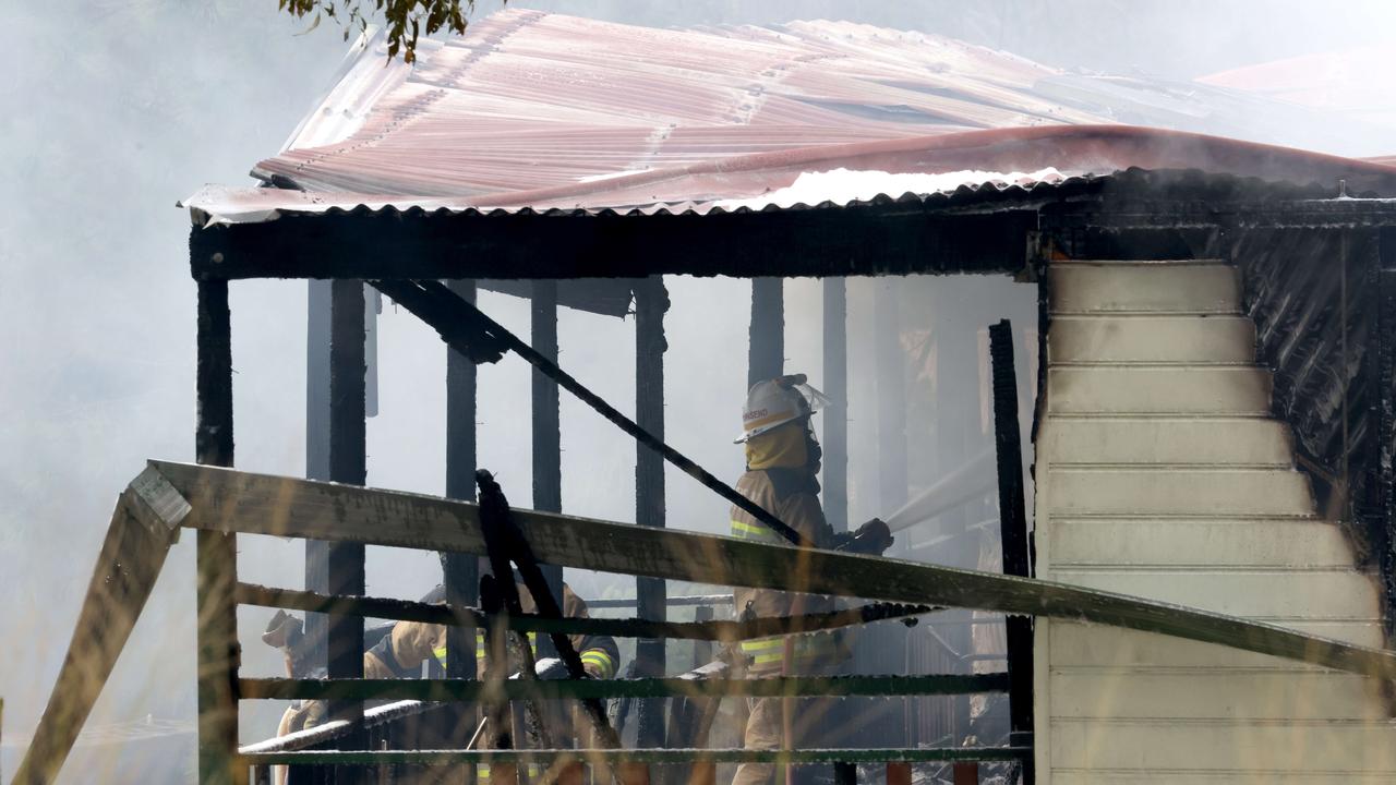 Police and Emergence services attend a fatal fire on Russell Island. Photo Steve Pohlner