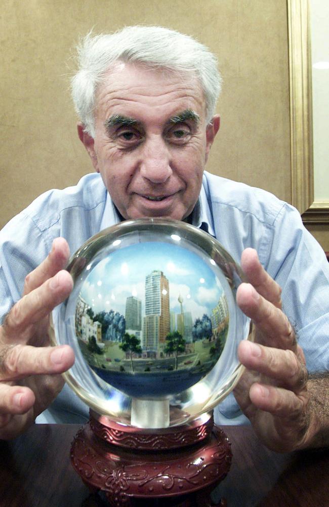 Meriton Aprartments development boss Harry Triguboff looks into his crystal ball at his office in Sydney in 2002.