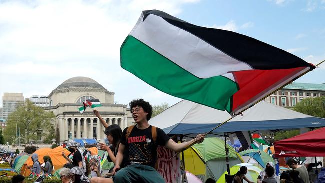 Protestors wave Palestinian flags on the West Lawn of Columbia University on April 29, 2024 in New York. Picture: Timothy A Clary / AFP