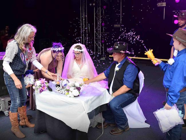 Simone Ward and Geoffrey Borninkhof, were married on The Hill Stage at Gympie Music Muster. Picture: Patrick Woods.