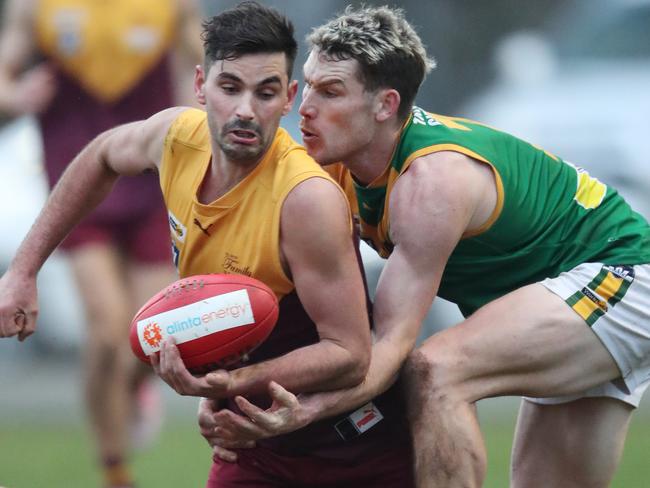 Gippsland League, round 9, Drouin Hawks V Leongatha Parrots, at Drouin, Charlie Bethune, 7,  Drouin  & Jackson Harry, 7,  Leongatha,    Picture Yuri Kouzmin