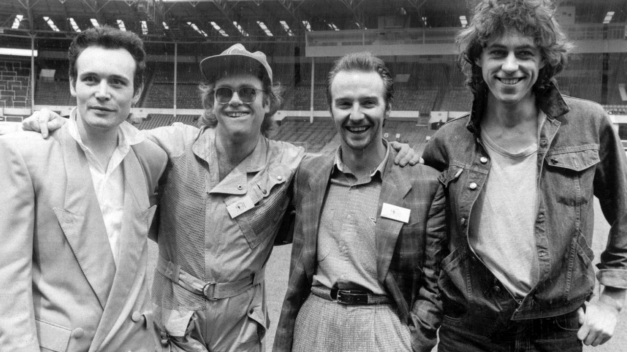 Adam Ant, Elton John, Midge Ure and Bob Geldof at Live Aid in 1985