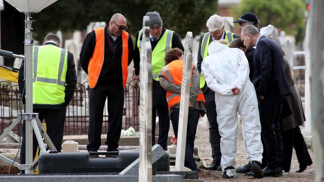 SA police and forensic detectives at the gravesite of the Somerton Man at West Terrace. The unknown man’s remains have been exhumed in a new bid to solve the mystery of his identity. Picture: NCA NewsWire / Kelly Barnes