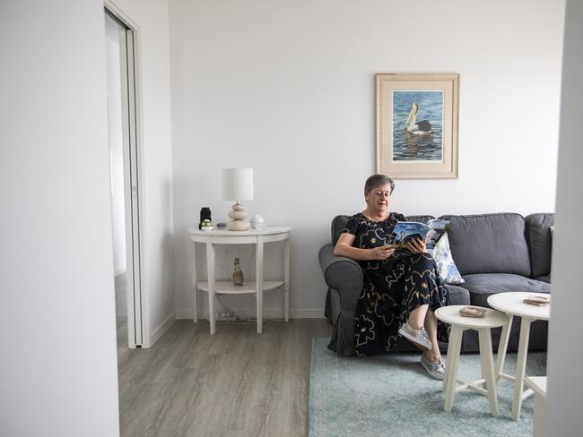 Lyn Lahood relaxes in her private sitting room, which adjoins her bedroom and ensuite. Picture: Mark Cranitch