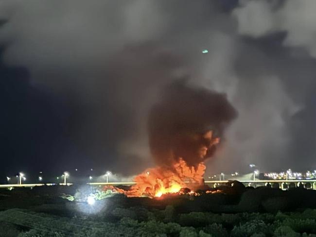 The fire on Hume Street, West Mackay broke out last night spreading fumes into neighbouring residential areas (Photo: Gasser Dion)