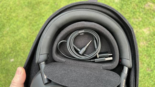 The headphones come with a rigid case, and a 3.5mm headphone cable, in case you want to use them wired. Picture: Elly Awesome