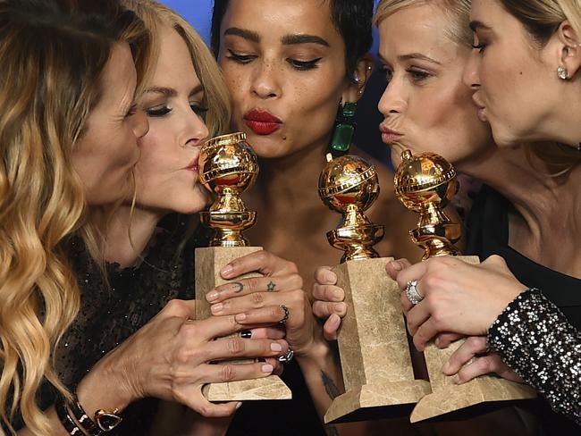 Laura Dern, from left, Nicole Kidman, Zoe Kravitz, Reese Witherspoon and Shailene Woodley pose in the press room with the award for best television limited series or motion picture made for television for "Big Little Lies" at the 75th annual Golden Globe Awards at the Beverly Hilton Hotel on Sunday, Jan. 7, 2018, in Beverly Hills, Calif. (Photo by Jordan Strauss/Invision/AP)