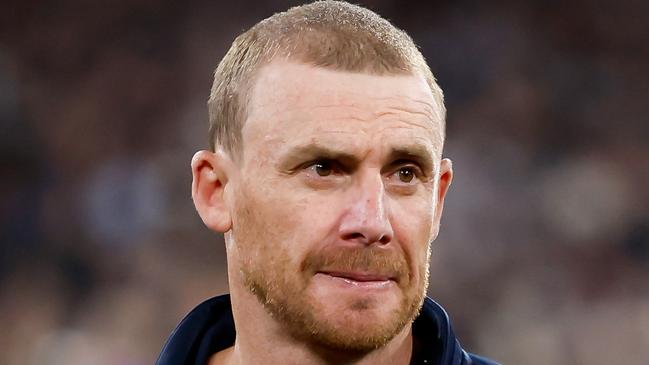 MELBOURNE, AUSTRALIA - SEPTEMBER 15: Simon Goodwin, Senior Coach of the Demons looks dejected after a loss  during the 2023 AFL First Semi Final match between the Melbourne Demons and the Carlton Blues at Melbourne Cricket Ground on September 15, 2023 in Melbourne, Australia. (Photo by Dylan Burns/AFL Photos via Getty Images)